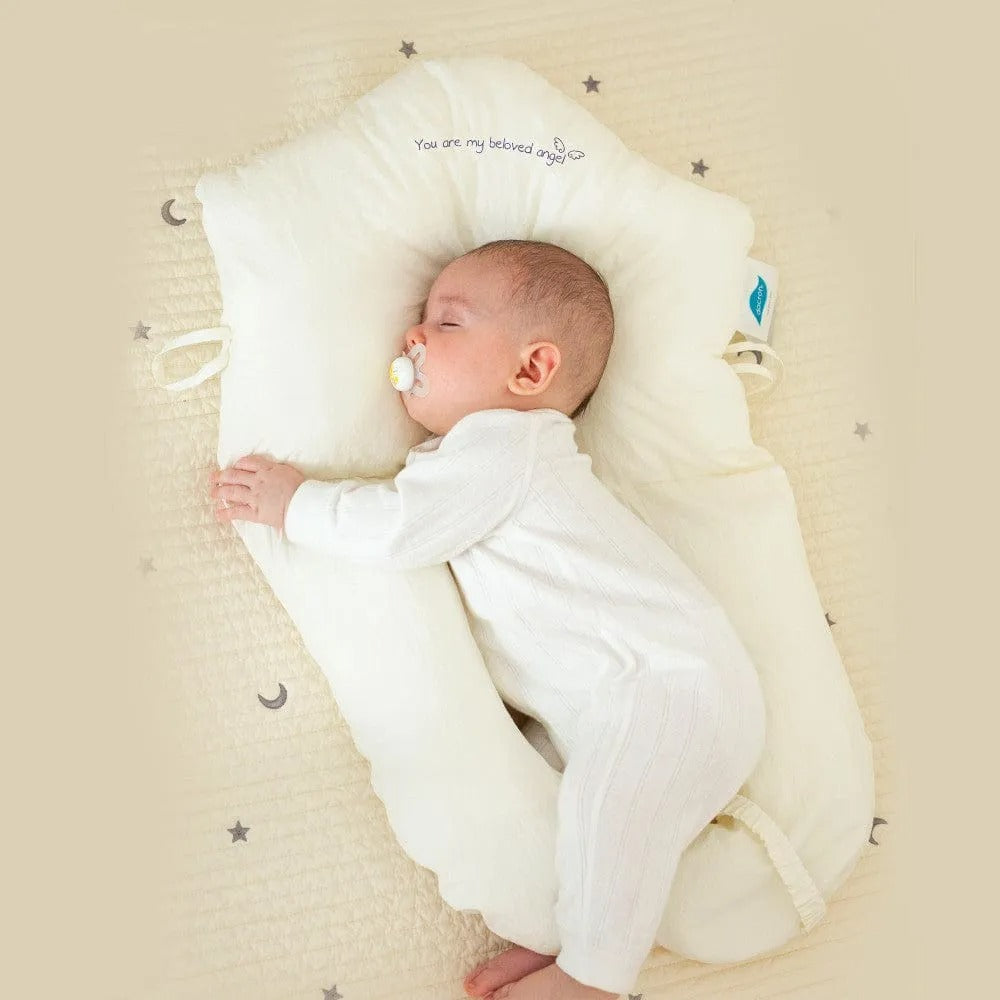 Belro infant support pillow with soft fabric and ergonomic design for gentle head and neck support in a cozy nursery setting.