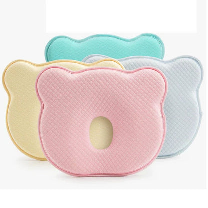 Belro ergonomic baby pillow with soft fabric, designed for comfort and support in a cozy nursery setting.