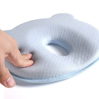 Belro ergonomic baby pillow with soft fabric cover, designed for infant comfort and support in home bedding.