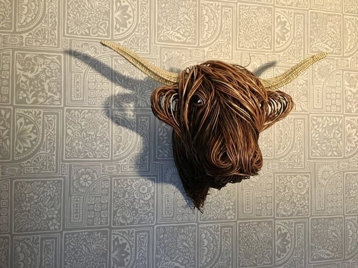 Wall-mounted cow sculpture by Belro, decorative metal figurine for home and garden decor, featuring a realistic cow design.