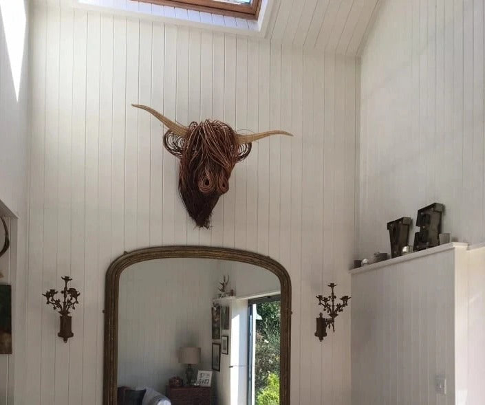Wall-mounted cow sculpture by Belro, decorative metal figurine for home and garden decor, featuring a realistic cow design.