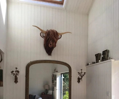 Wall-mounted cow sculpture by Belro, decorative metal figurine for home and garden decor, featuring a realistic cow design.