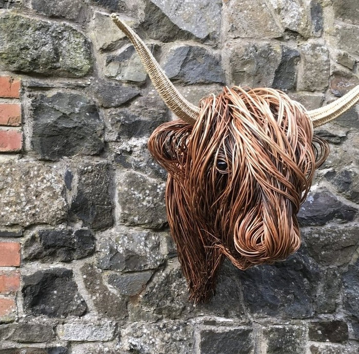 Wall-mounted Belro cow sculpture for home decor, featuring a detailed, rustic metal design suitable for farmhouse or rustic interiors.