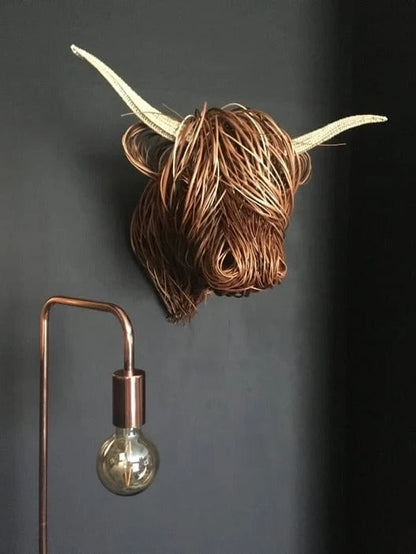 Wall-mounted cow sculpture by Belro, decorative metal figurine for home and garden decor, featuring a detailed cow design.