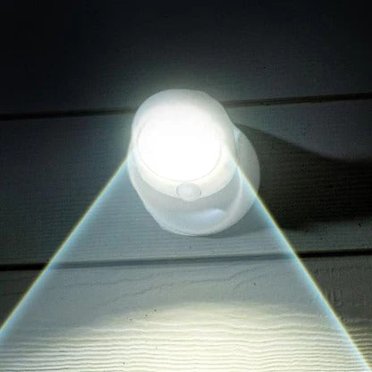 Belro motion-activated LED lamp with sleek electronic design, illuminated in a modern setting.