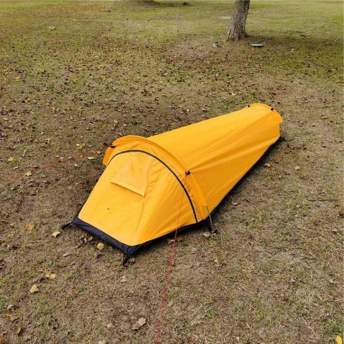 Belro ultralight single-person tent set up outdoors, showcasing compact and lightweight design for backpacking or camping.