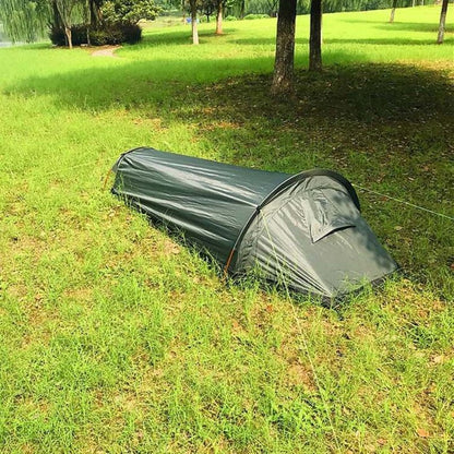 Belro ultralight single-person tent set up outdoors, showcasing its compact, lightweight design ideal for solo camping adventures.