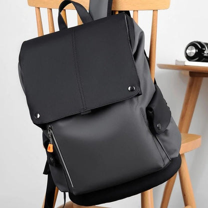 Belro Everyday Backpack designed for electronics and laptops, showing the sleek black backpack with multiple compartments.