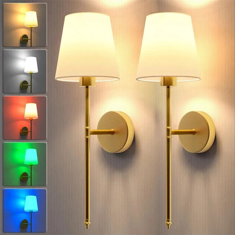 Belro wireless outdoor wall light installed on a garden wall, providing ambient illumination for outdoor spaces.