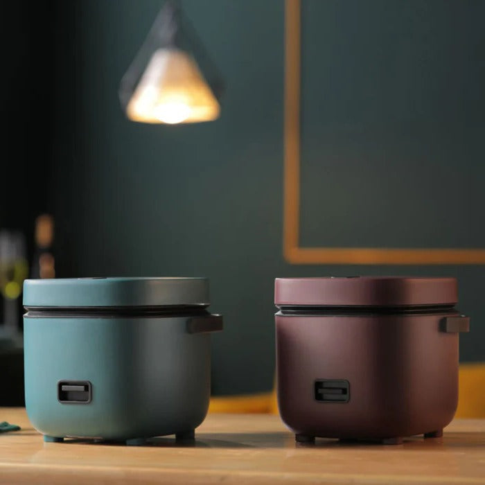 Belro mini rice cooker for home and kitchen use, compact design with lid and control panel visible in the image.