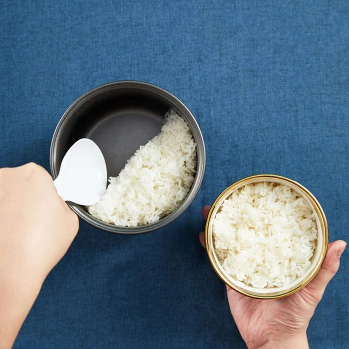 Belro mini rice cooker for home use, compact kitchen appliance with a sleek design, perfect for quick rice preparation.