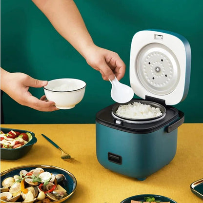 Belro mini rice cooker on kitchen countertop, compact appliance for quick rice preparation in home and dining settings.
