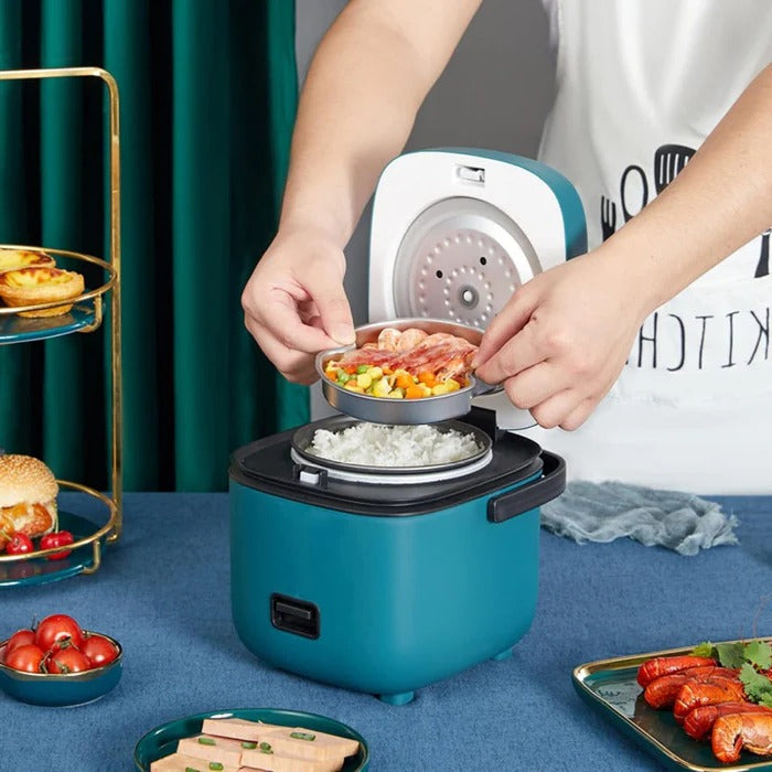 Belro mini rice cooker on kitchen countertop, compact design ideal for home use and convenient rice preparation.