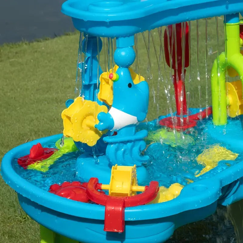 Image of a Belro 3-in-1 outdoor sand and water table for kids, featuring colorful plastic compartments and a sturdy outdoor stand.