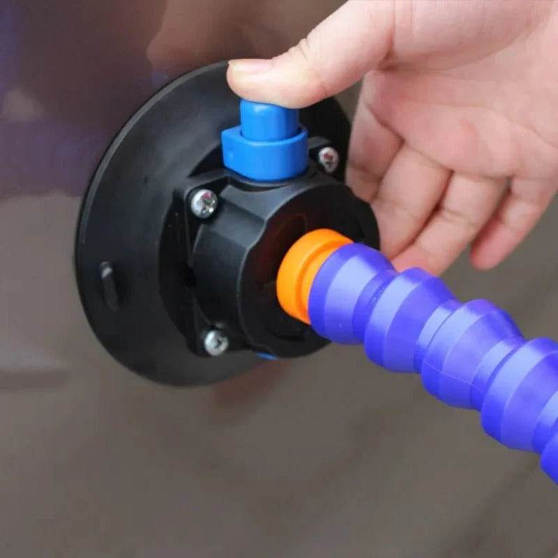 Belro Car Dent Repair Tool, handheld plastic device for removing dents from vehicle surfaces, shown in use on a car.