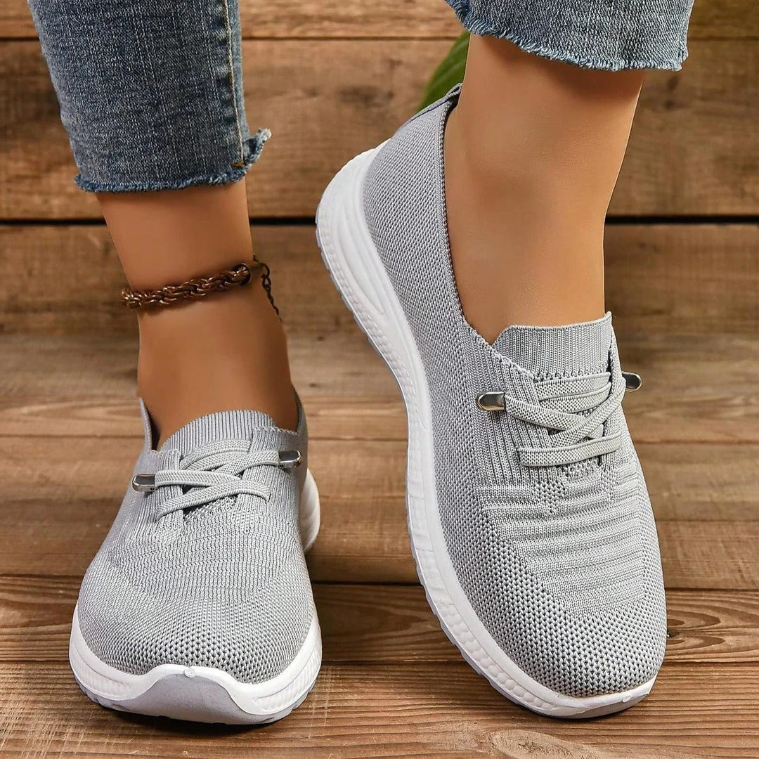 Belro women's comfort sneakers paired with cozy socks, showcasing casual footwear with soft, cushioned design for everyday wear.