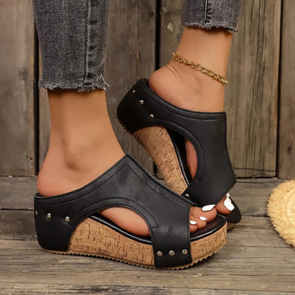 Women's Belro studded wedge sandals featuring ankle straps and open toes, perfect for casual summer wear.