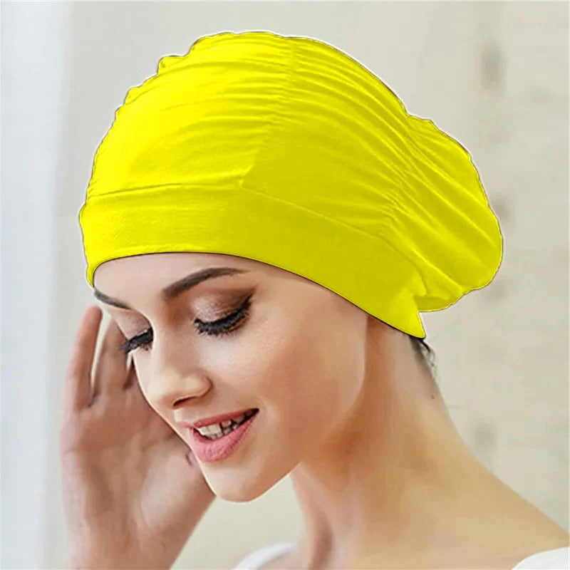 Belro stylish stretch swimming cap in vibrant blue, designed for comfortable outdoor swimming and water activities.
