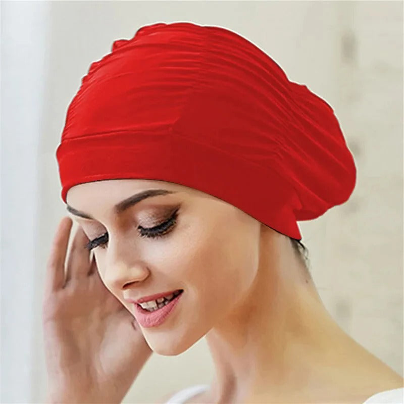 Belro stylish stretch swimming cap in vibrant blue, designed for comfortable fit during outdoor swimming activities.
