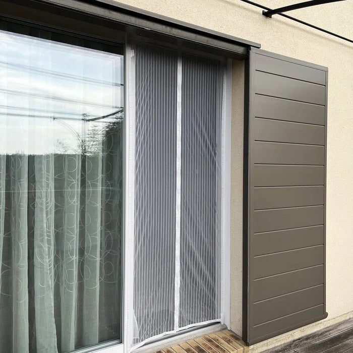 Belro magnetic door mosquito net installed in a doorway, providing outdoor insect protection for home and garden use.