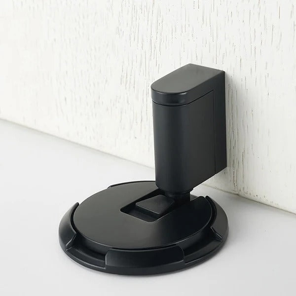 Belro heavy-duty adjustable door stopper mounted on a door, made of durable metal, designed to prevent door movement and damage.