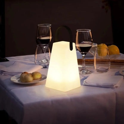 Belro cordless waterproof LED table lamp with built-in handle, designed as a versatile accessory for outdoor or indoor use