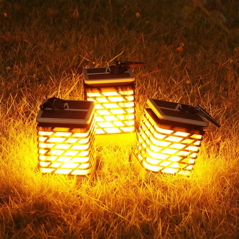 Belro Solar LED Garden Lantern illuminating an outdoor garden space with a warm, soft glow during dusk.