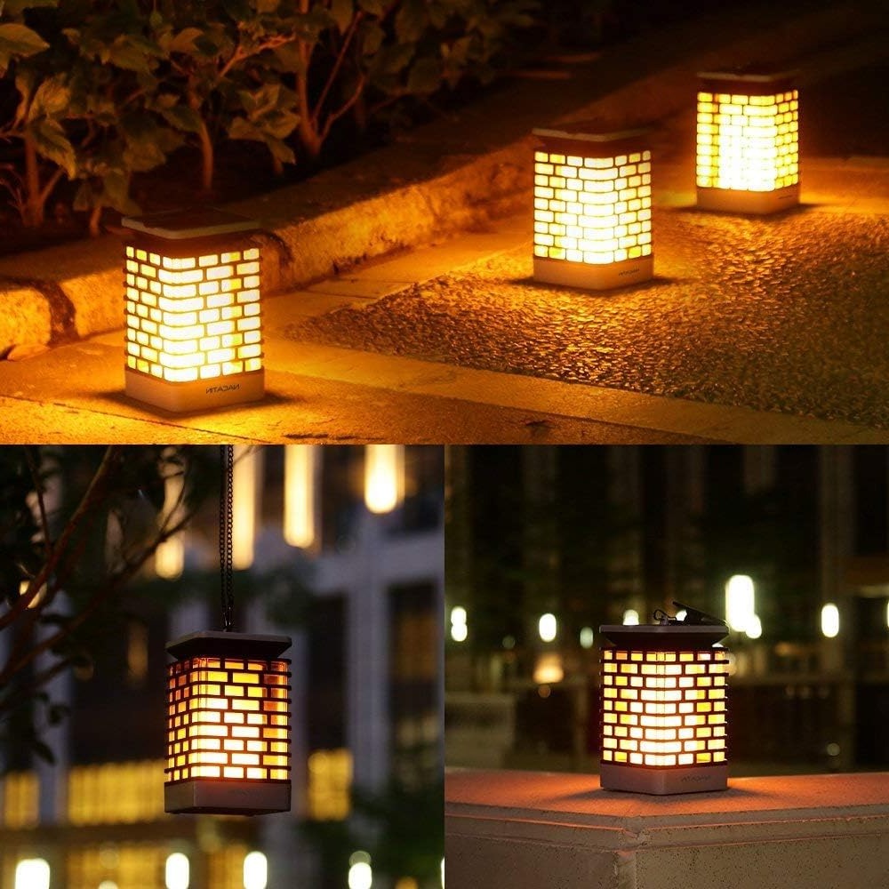 Belro solar LED garden lantern illuminating a garden path with warm light, perfect for outdoor home and garden decor.