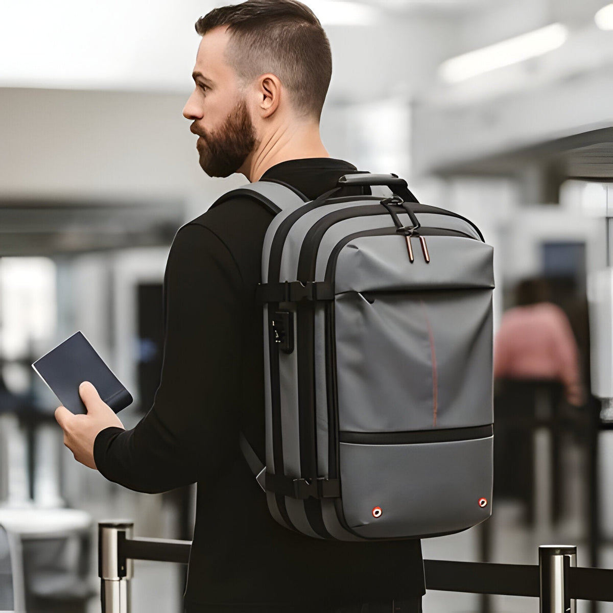 Belro structured rucksack with internal compression system, showcasing durable fabric, adjustable straps, and compact design for activewear.