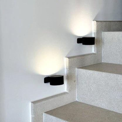 Belro rechargeable wall light with 360° rotation, ideal for versatile lighting in modern electronics and camera setups.