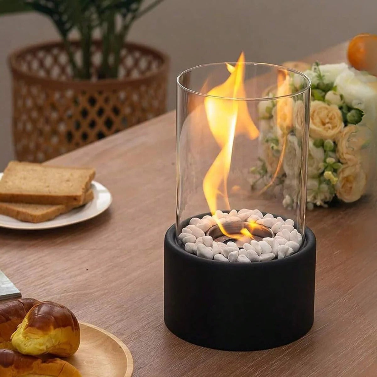 Belro portable glass tabletop fireplace for outdoor use, featuring a sleek design and clear glass sides for a stylish outdoor ambiance.