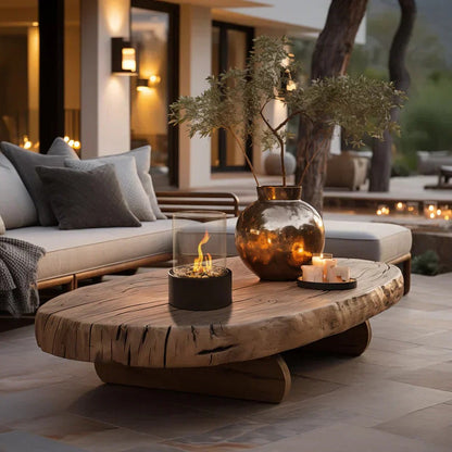 Belro portable glass tabletop fireplace for outdoor use, featuring a sleek design and safety glass enclosure.
