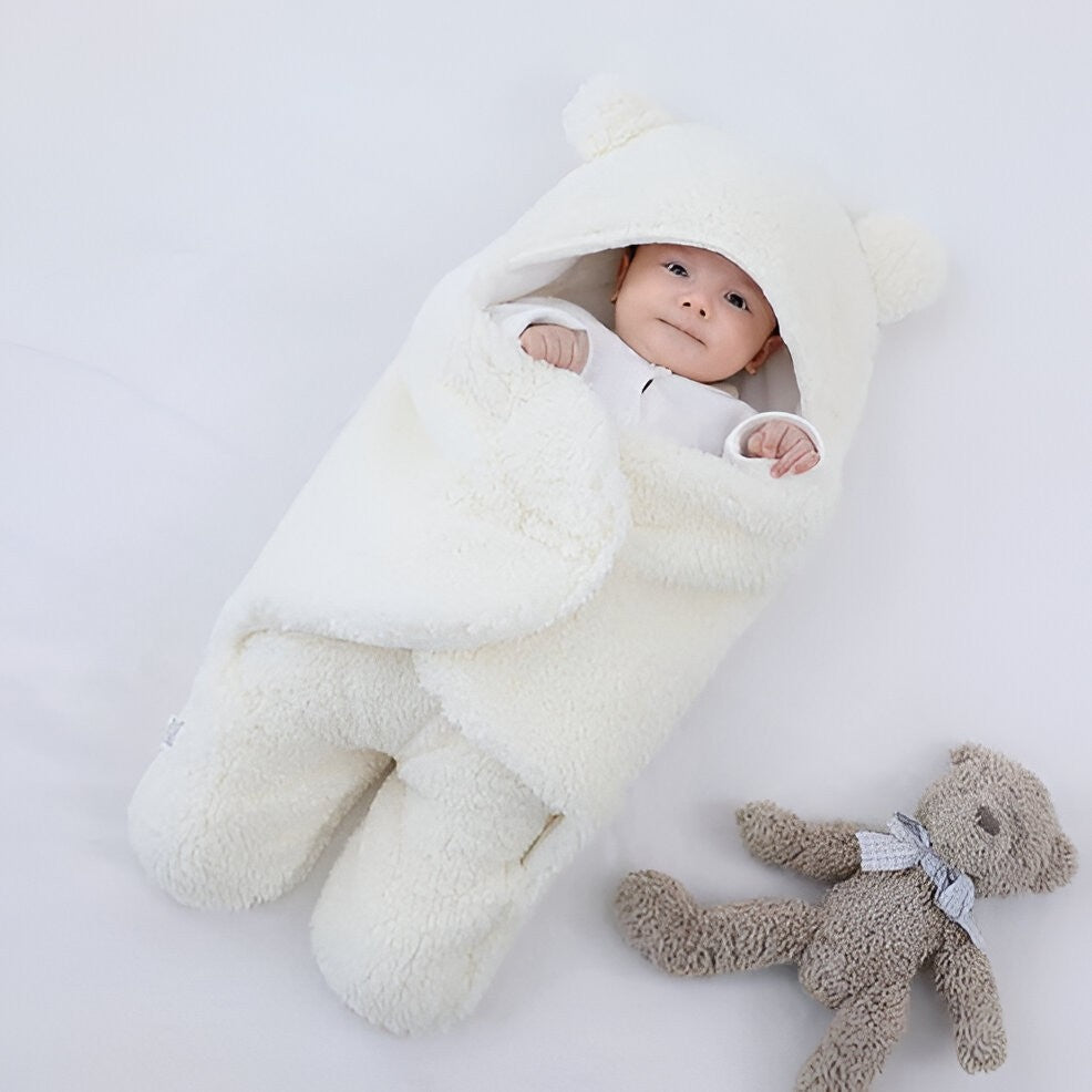 Soft Belro baby blanket with pastel colors and cozy texture, perfect for nursery or stroller use.