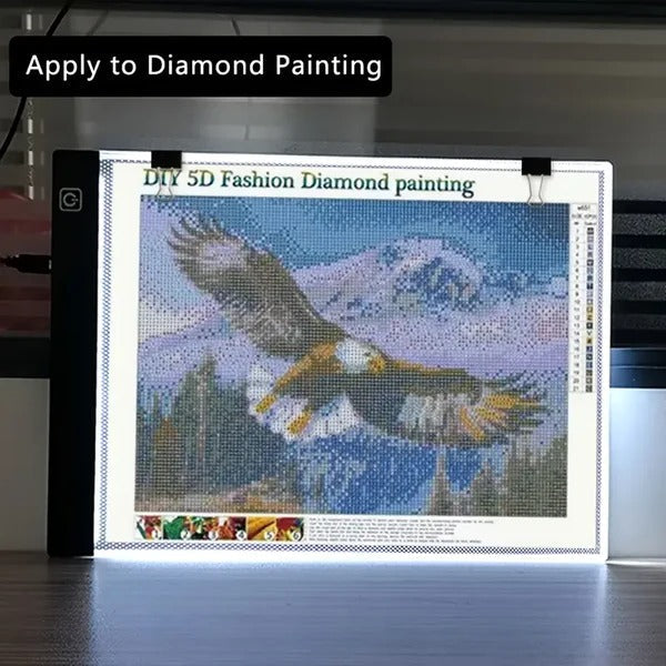Belro A4 LED Tracing Light Box for men, with illuminated surface ideal for detailed clothing design and pattern tracing.