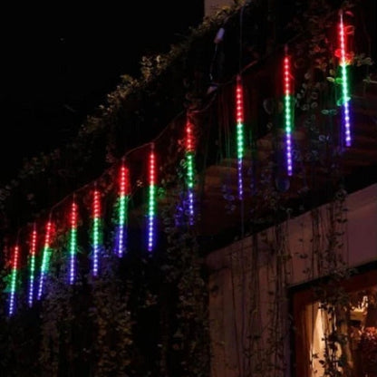 Belro LED dripping icicle lights hanging outdoors, decorative string lights for home and garden decor.