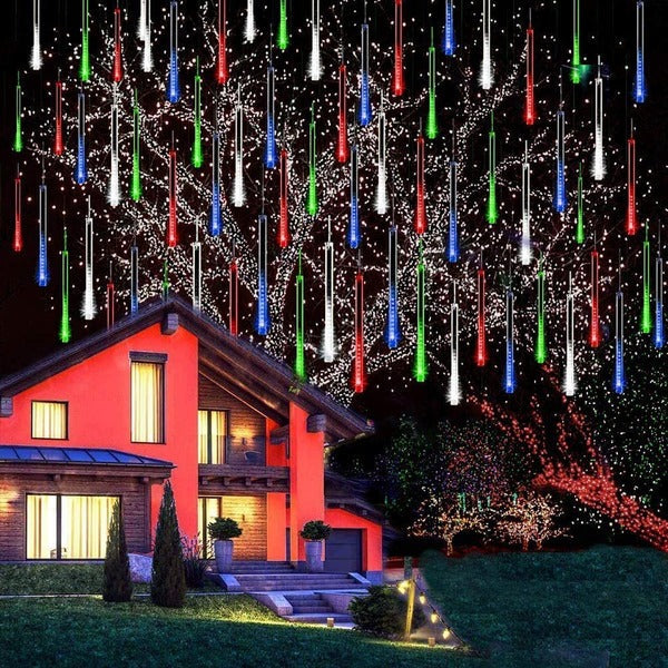 Belro LED Dripping Icicle Lights hanging outdoors, creating a festive, glowing winter display for home and garden decoration.