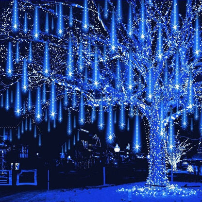 Belro LED dripping icicle lights hanging outdoors, decorative string lights for home and garden illumination.