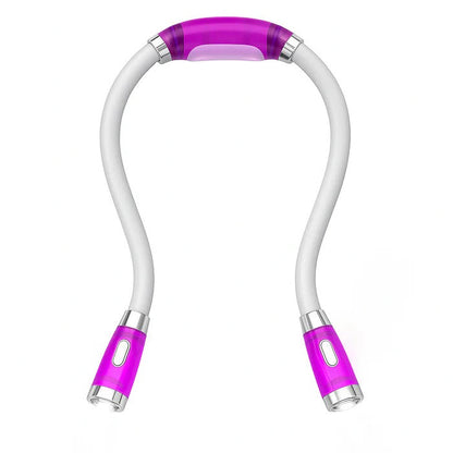 Belro hands-free reading light clipped onto a book, ideal for office and stationery use. Compact and adjustable design.