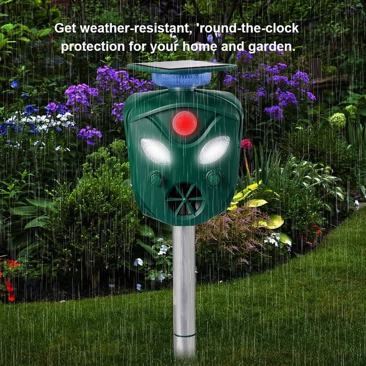 Belro 360° Solar Ultrasonic Animal Repeller in outdoor garden setting, showing device with solar panel and infrared sensors.