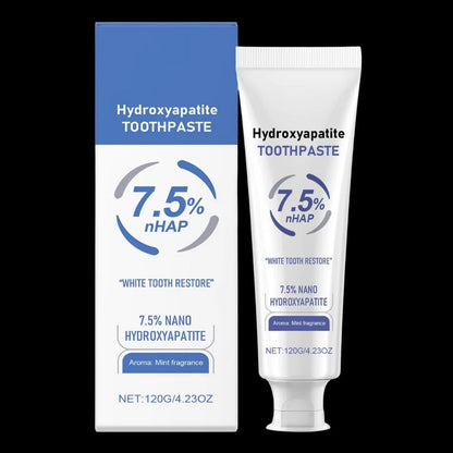 Belro fluoride-free enamel toothpaste in a white tube with mint green accents, placed on a bathroom countertop.