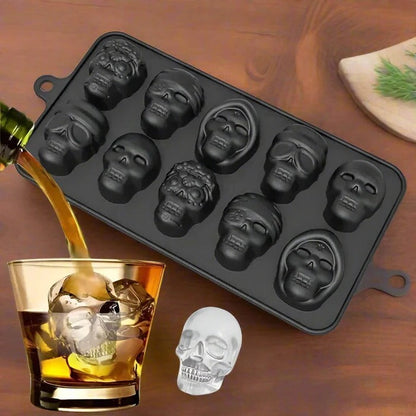 Skull-shaped ice cubes in a Belro silicone tray for fun, decorative drinks in kitchen and dining settings.
