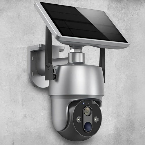 Belro solar-powered outdoor surveillance camera mounted on a wall, capturing security footage in a backyard setting.