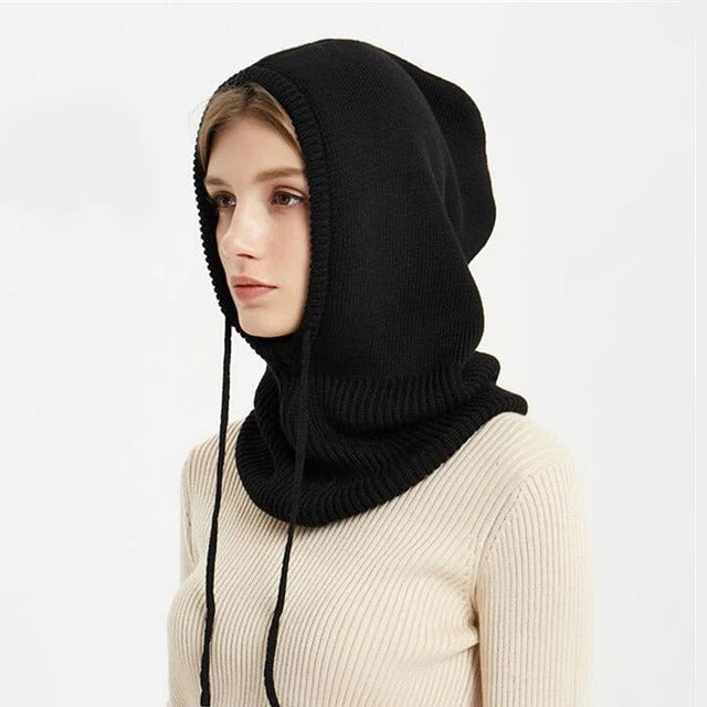 Soft beige cashmere knit beanie by BowLift, cozy winter hat for cold weather, unisex style with a snug fit.