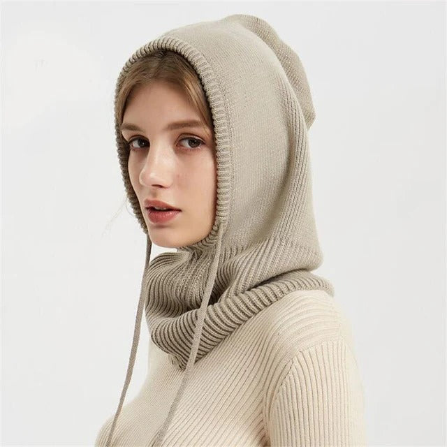 Soft beige cashmere knit beanie by BowLift, warm unisex winter hat with a cozy, textured knit pattern for cold weather.