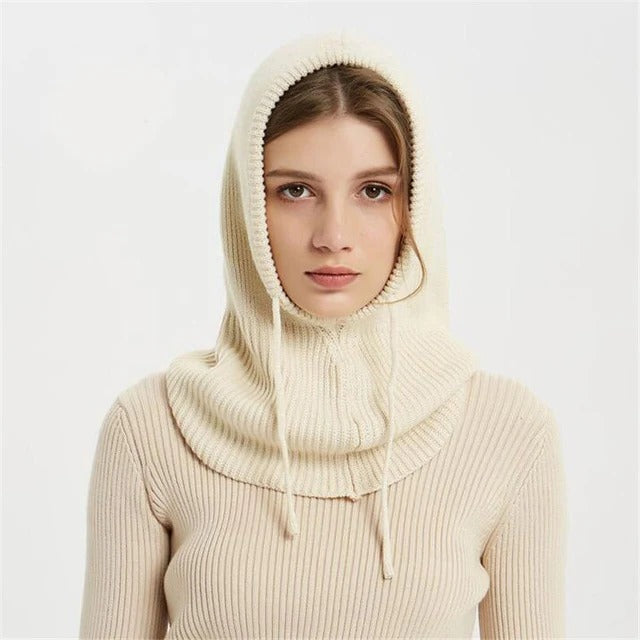 Soft beige cashmere knit beanie by BowLift, unisex winter hat with a cozy, warm design for cold weather.