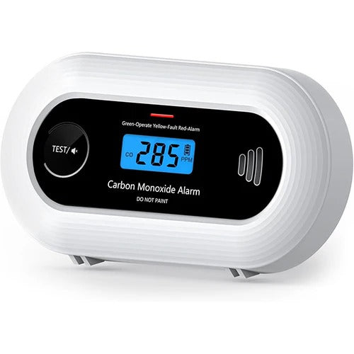 Belro smart carbon monoxide detector installed outdoors in a garden, with digital display and safety sensors for home protection.