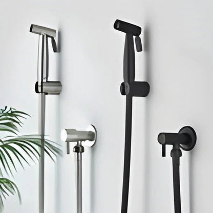 Belro handheld bidet sprayer attached to a bathroom sink, showcasing its sleek design and easy-to-use hardware features.