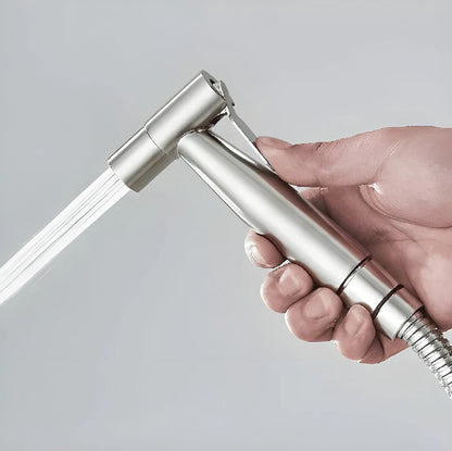 Belro handheld bidet sprayer attached to bathroom sink with flexible hose, versatile tools and hardware for personal hygiene.
