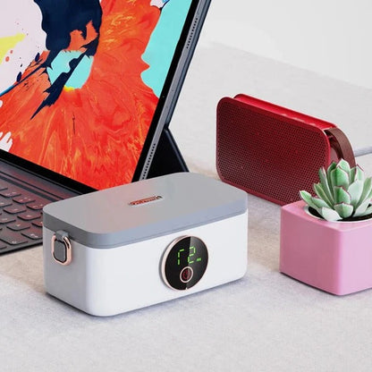 Belro wireless heated lunch box inside a travel bag, designed for portable food heating on the go.