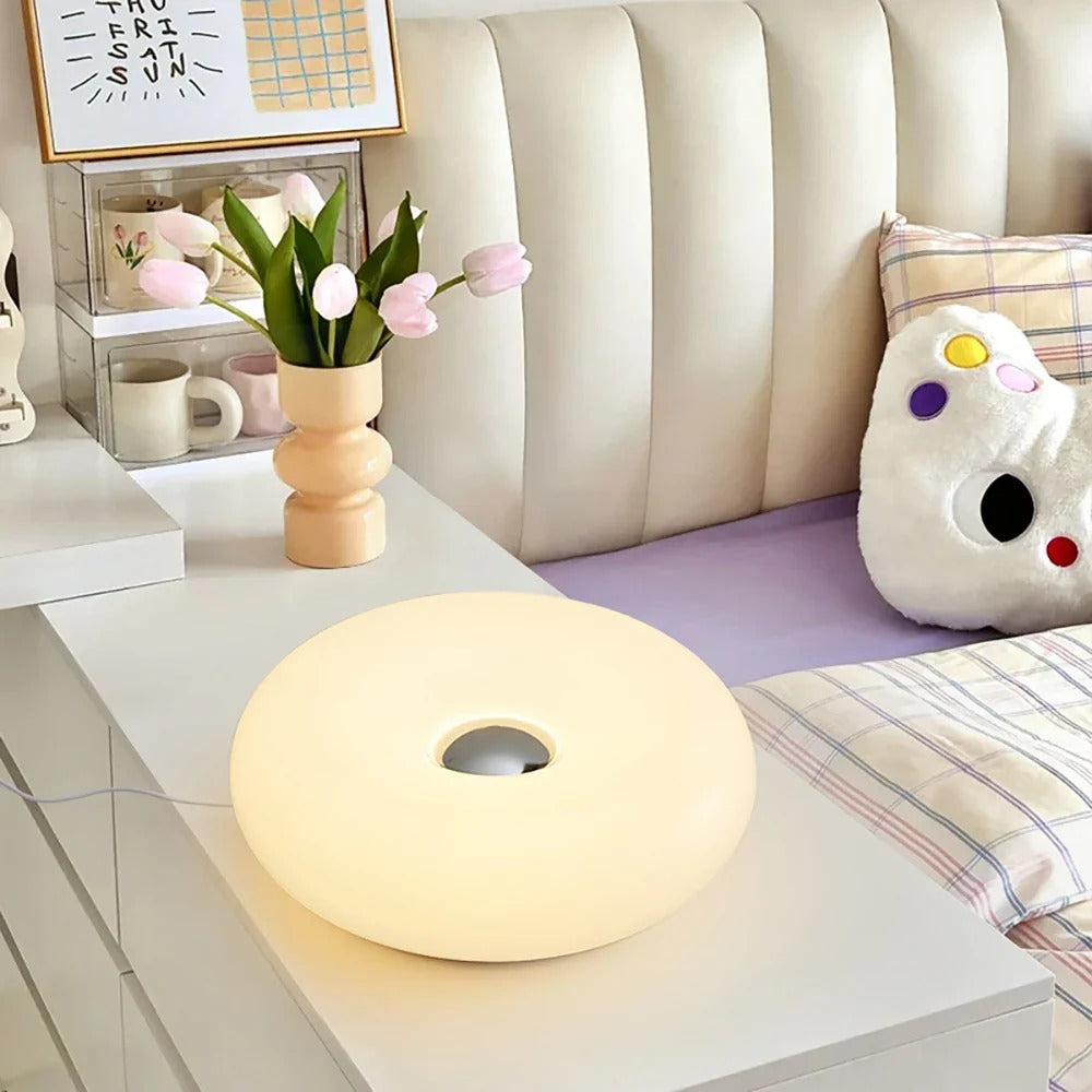 Belro Donut LED Touch Lamp emitting soft light, modern electronic night light with touch control for cozy ambiance.